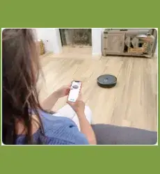 Person using a smartphone app to control smart home devices with an intuitive user interface and seamless 