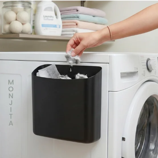 MONJITA Black Plastic Magnetic Lint Bin attached to a washing machine with open top design