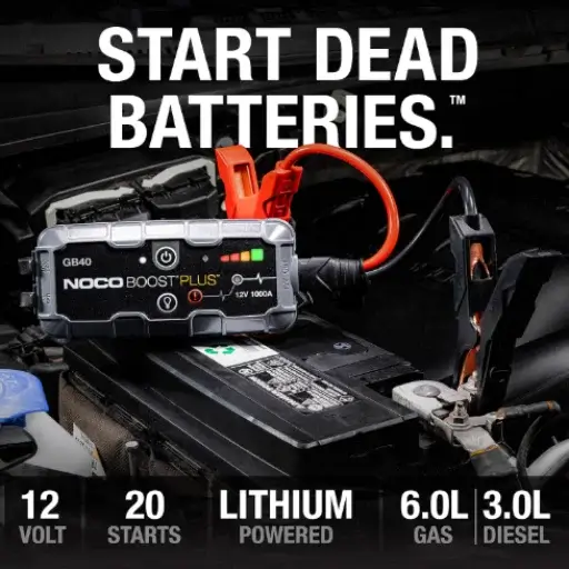 NOCO Boost Plus GB40 lithium emergency portable car gadget jump starting a dead 12V battery under the car hood.